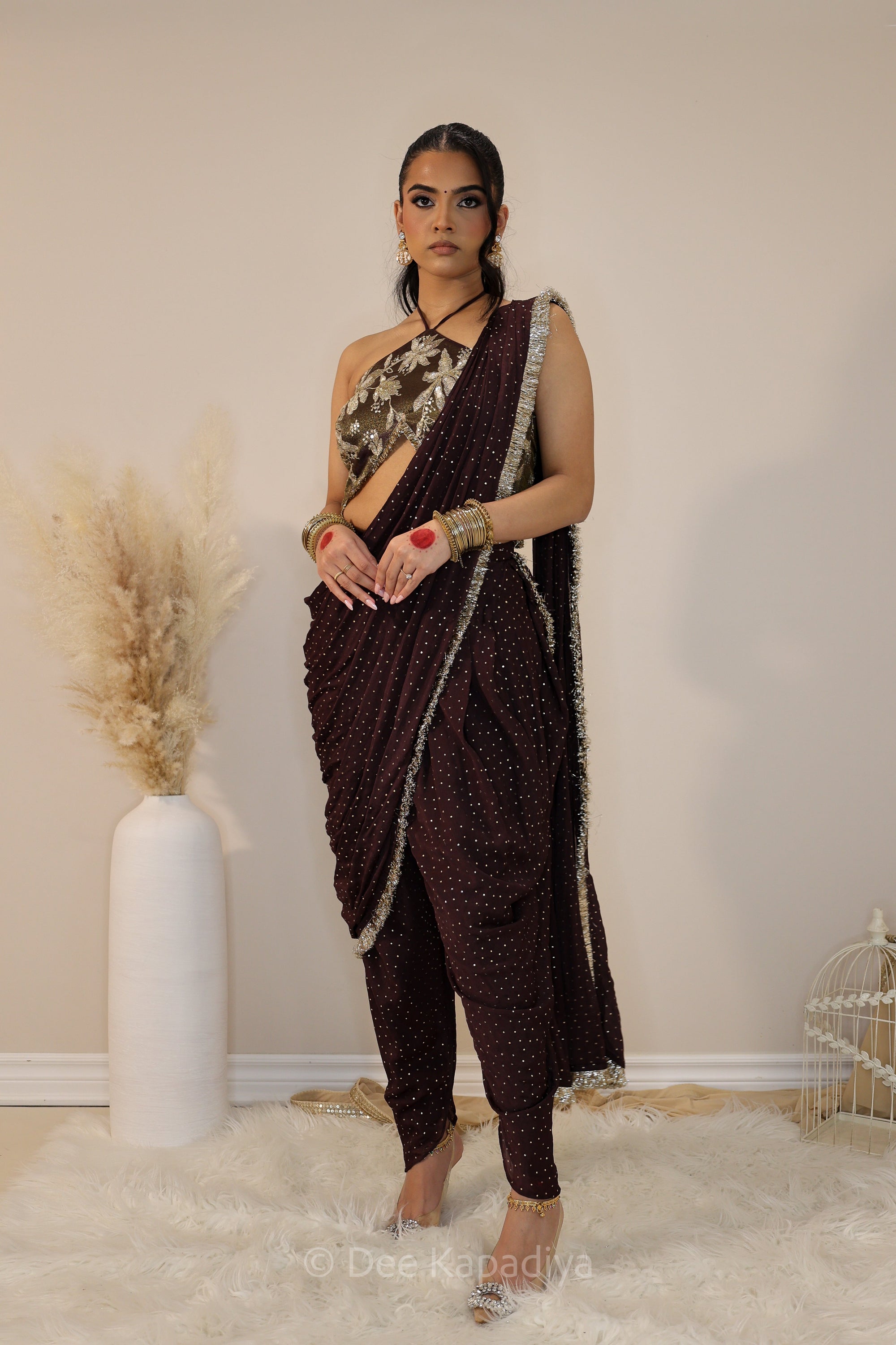 chocolate brown dhoti saree with silver and gold embellishments and tassel edging, pre-draped and pre-pleated ready to wear 