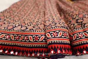 Close-up of real mirror work and ajrakh embroidered edging on the hem of Bahaar Gharara Set by Dee Kapadiya — Rooted in Ajrakh Vol. I Sukoon collection