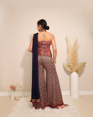 Dee Kapadiya Bahaar Gharara Set in Jamuni Blue — back view showing halter neck Mastani top and Bahaar gharara hem with ajrakh embroidered border and mirror work, sangeet mehndi outfit Toronto