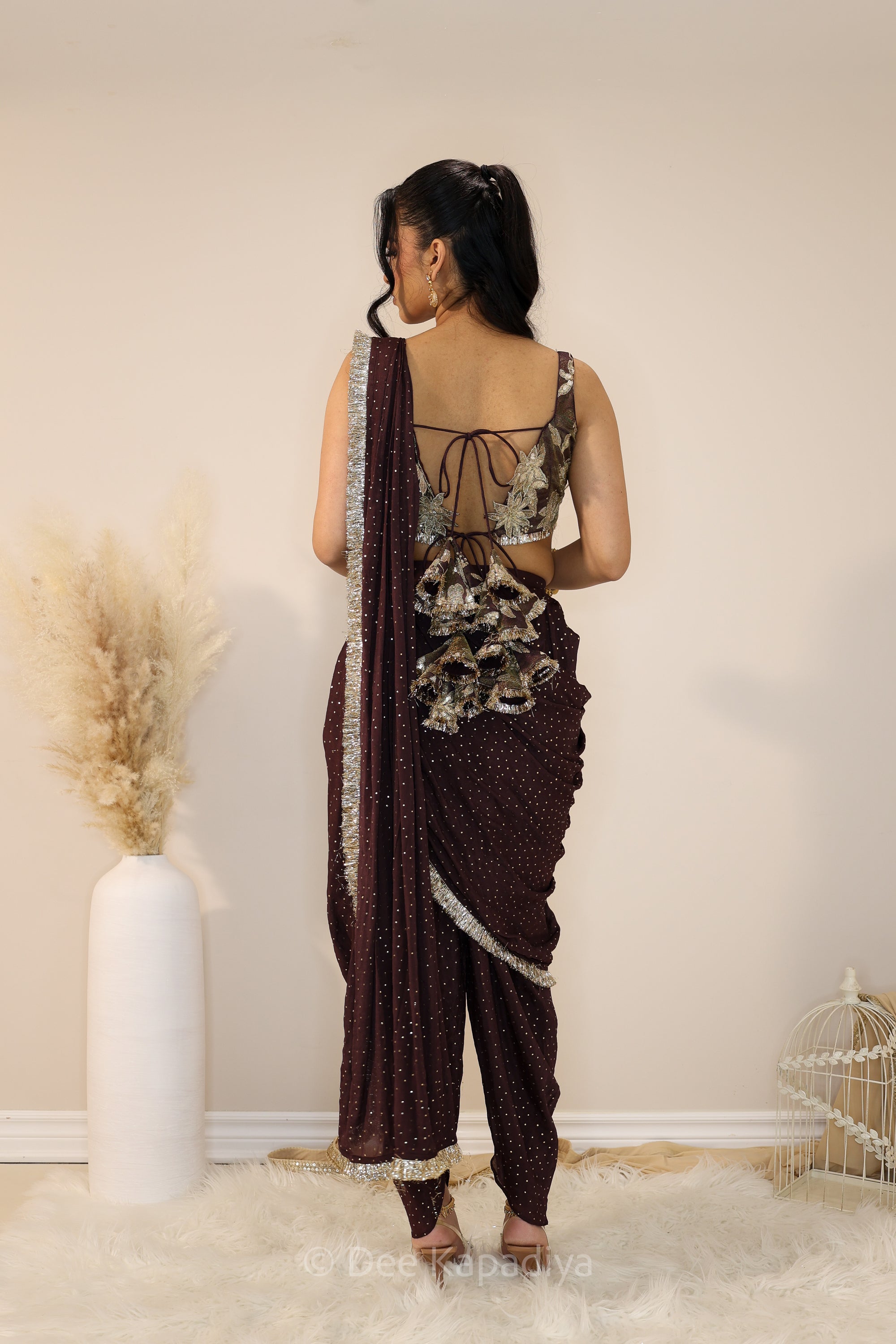 DEVI Dhoti saree with Jodha Croptop espresso plum back
