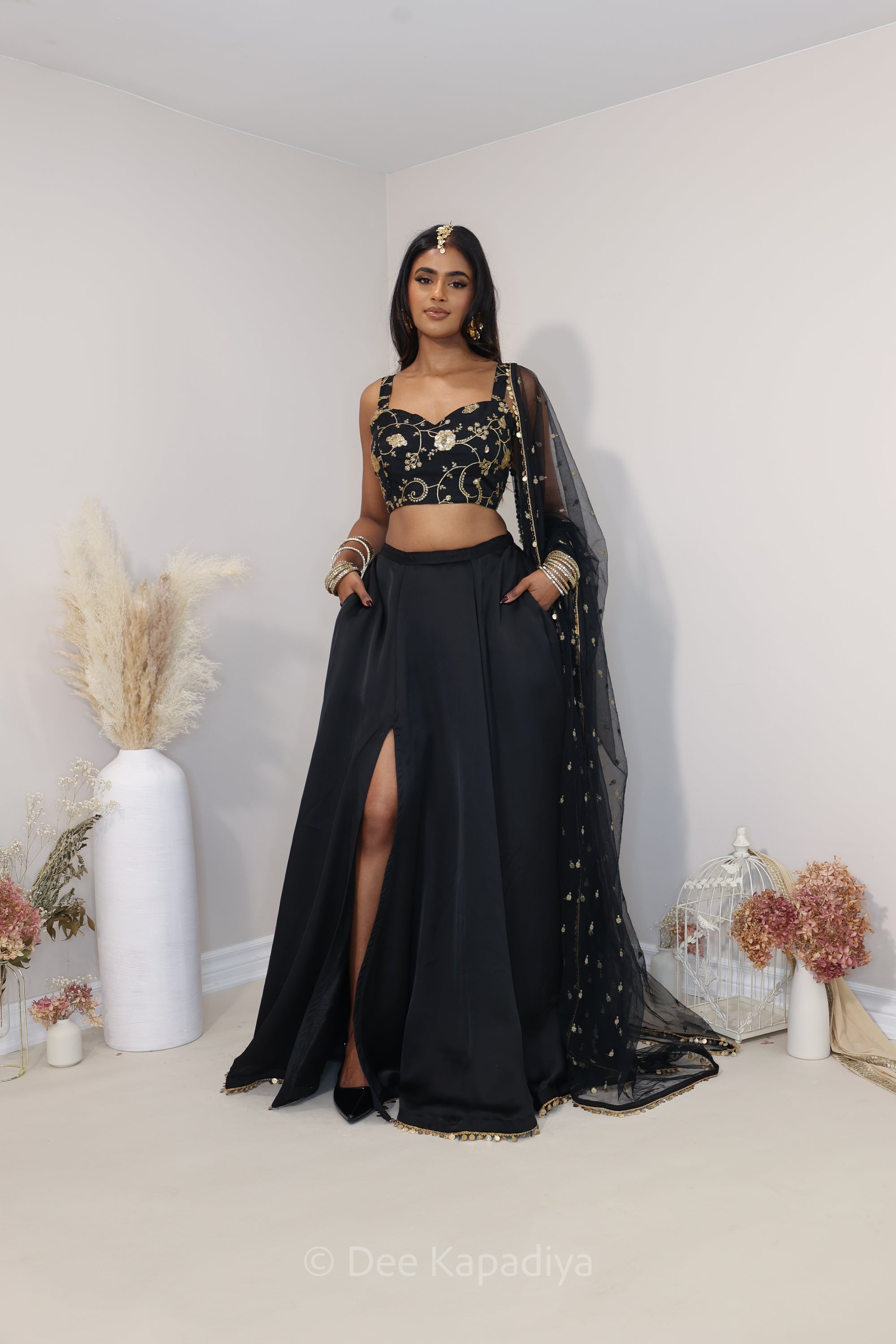 Classic black and gold lehenga loved by all desi girl, perfect for dancing and twirling with slit and pockets