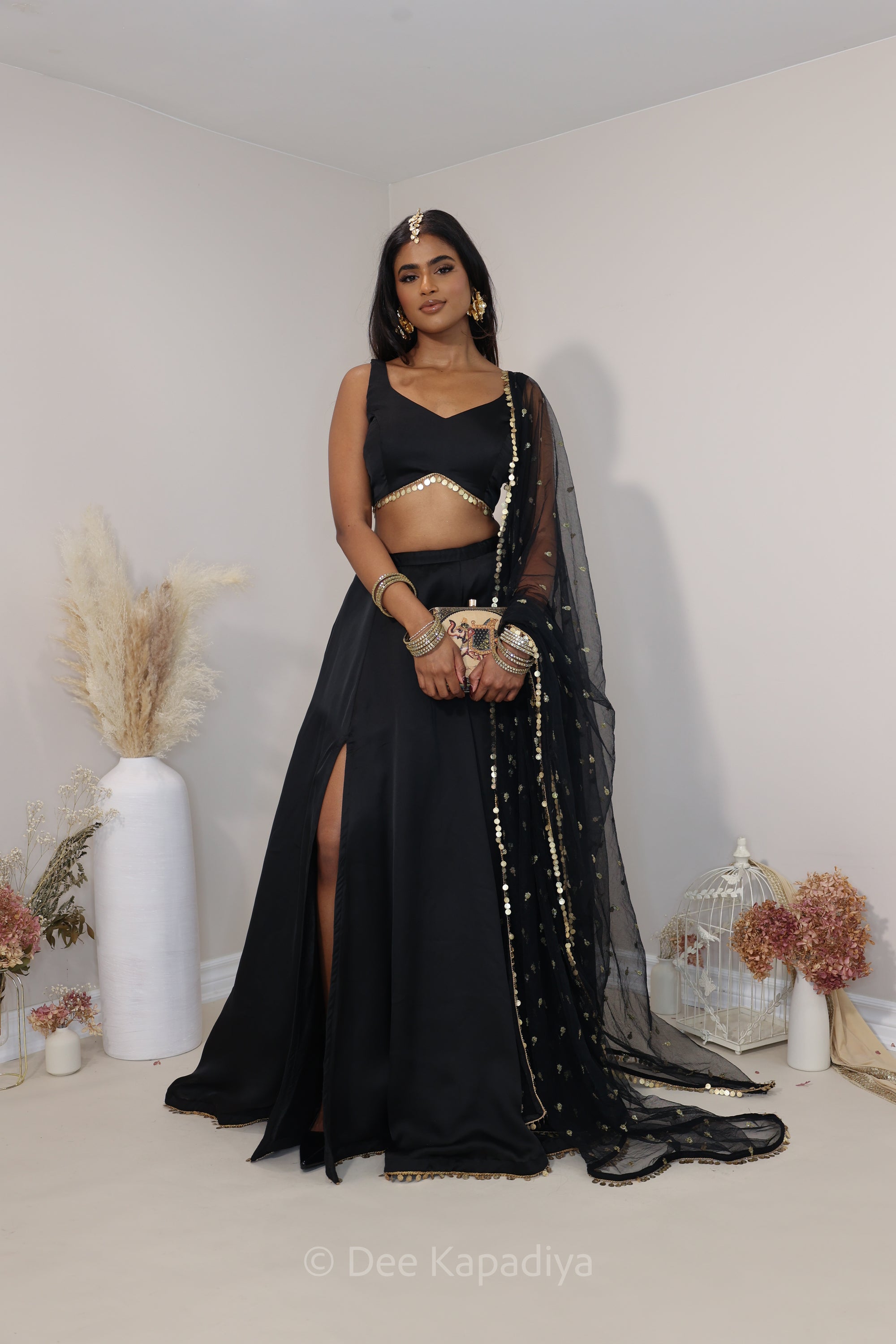 Classic black and gold lehenga loved by all desi girl, perfect for dancing and twirling with slit and pockets