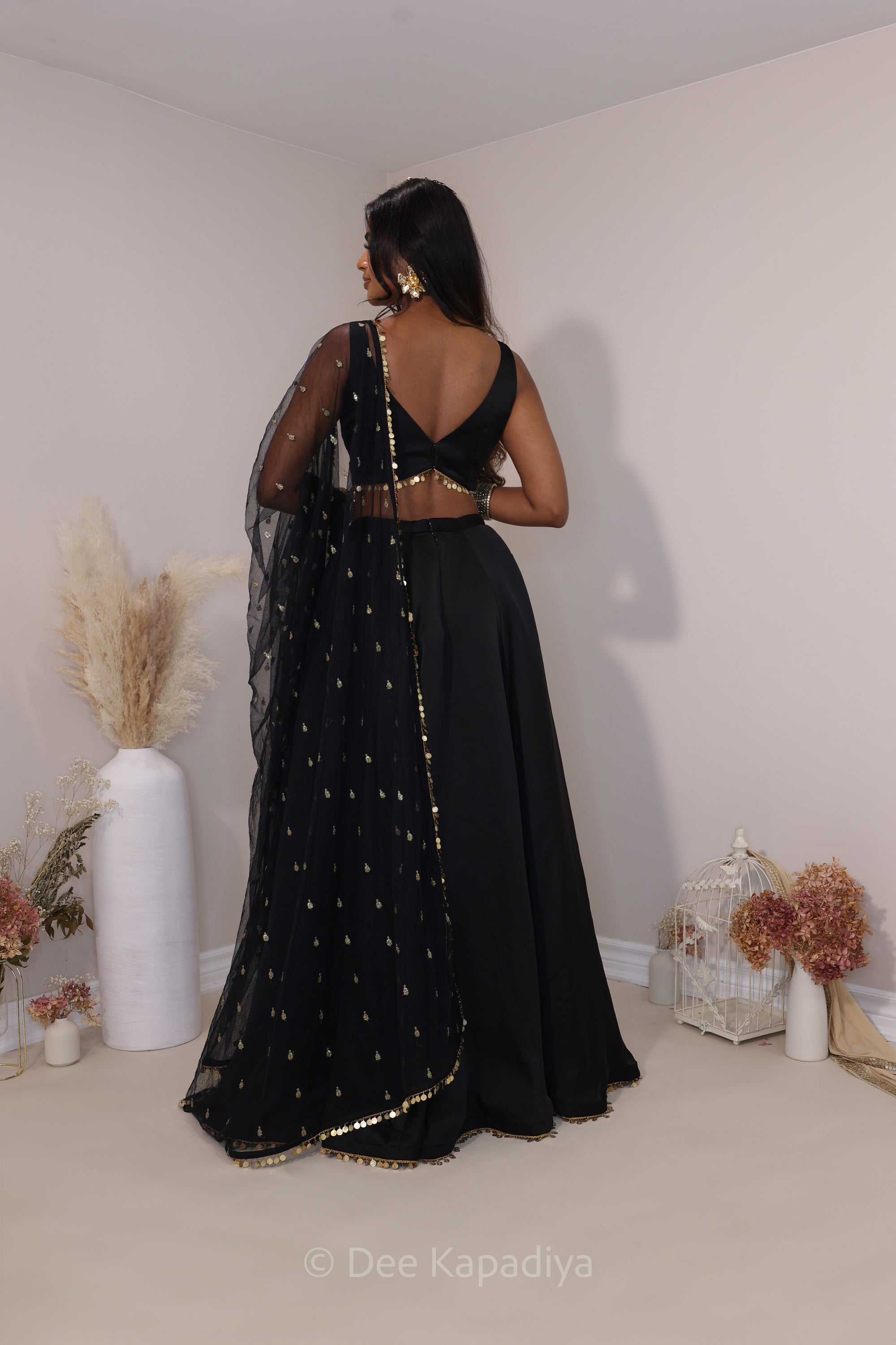 Classic black and gold lehenga loved by all desi girl, perfect for dancing and twirling with slit and pockets