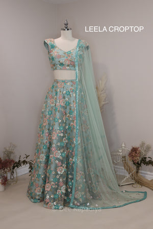 Modern and chic, sexy, feminine lehenga in sea foam blue, for pre or post Indian or fusion inter cultural weddings. It's a beautiful lehenga for sagan, sangeet, mehendi, after party, bridal shower.