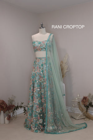 Modern and chic, sexy, feminine lehenga in sea foam blue, for pre or post Indian or fusion inter cultural weddings. It's a beautiful lehenga for sagan, sangeet, mehendi, after party, bridal shower.