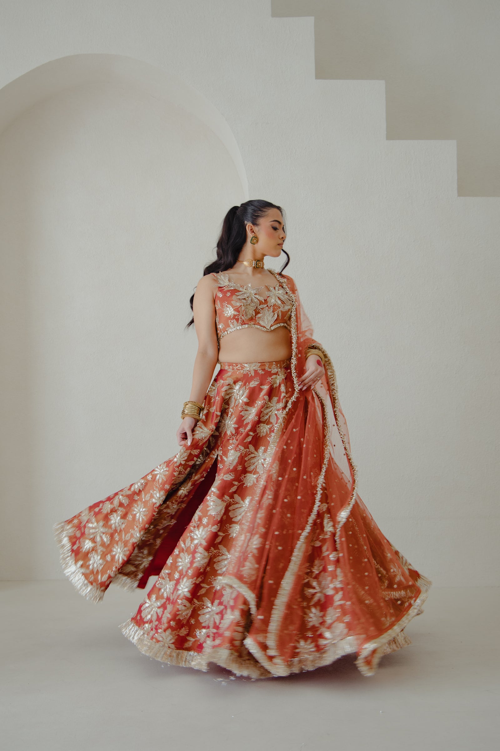 JODHA lehenga set in sunkissed rust front campaign 