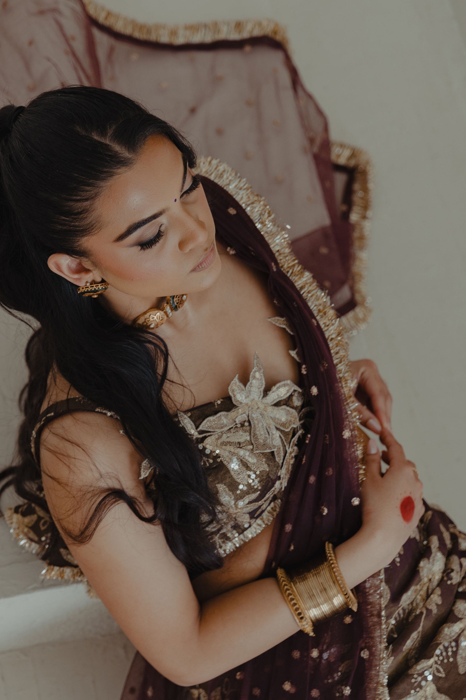 Jodha ct Vaani lehenga set in espresso plum campaign pose 1 