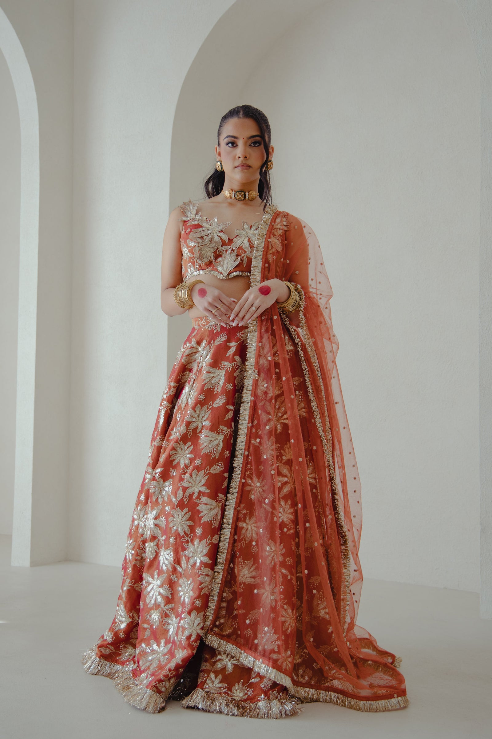 JODHA lehenga set in sunkissed rust front campaign 