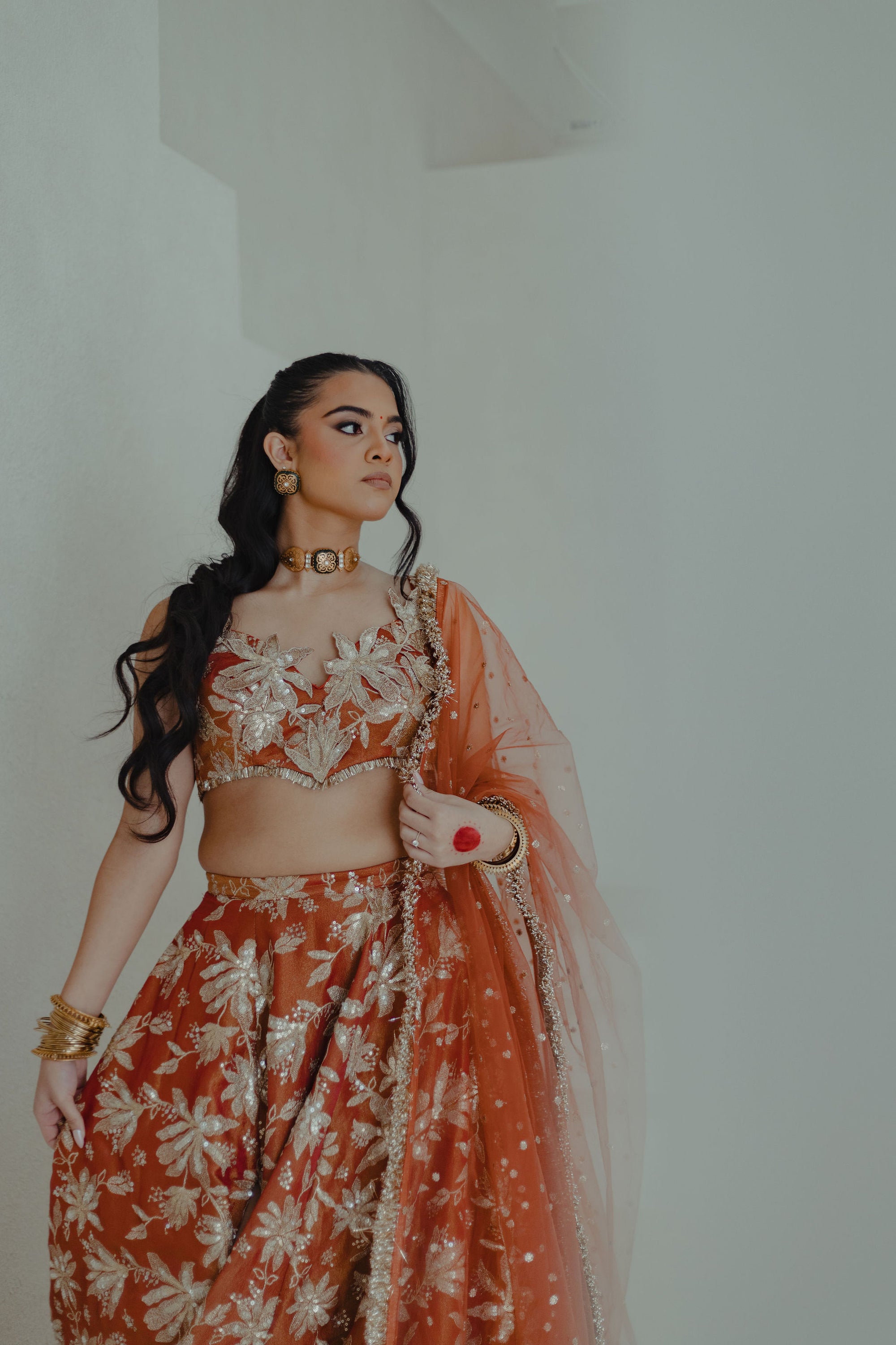 Jodha_lehenga_set_in_sunkissed_rust_front 4_campaign