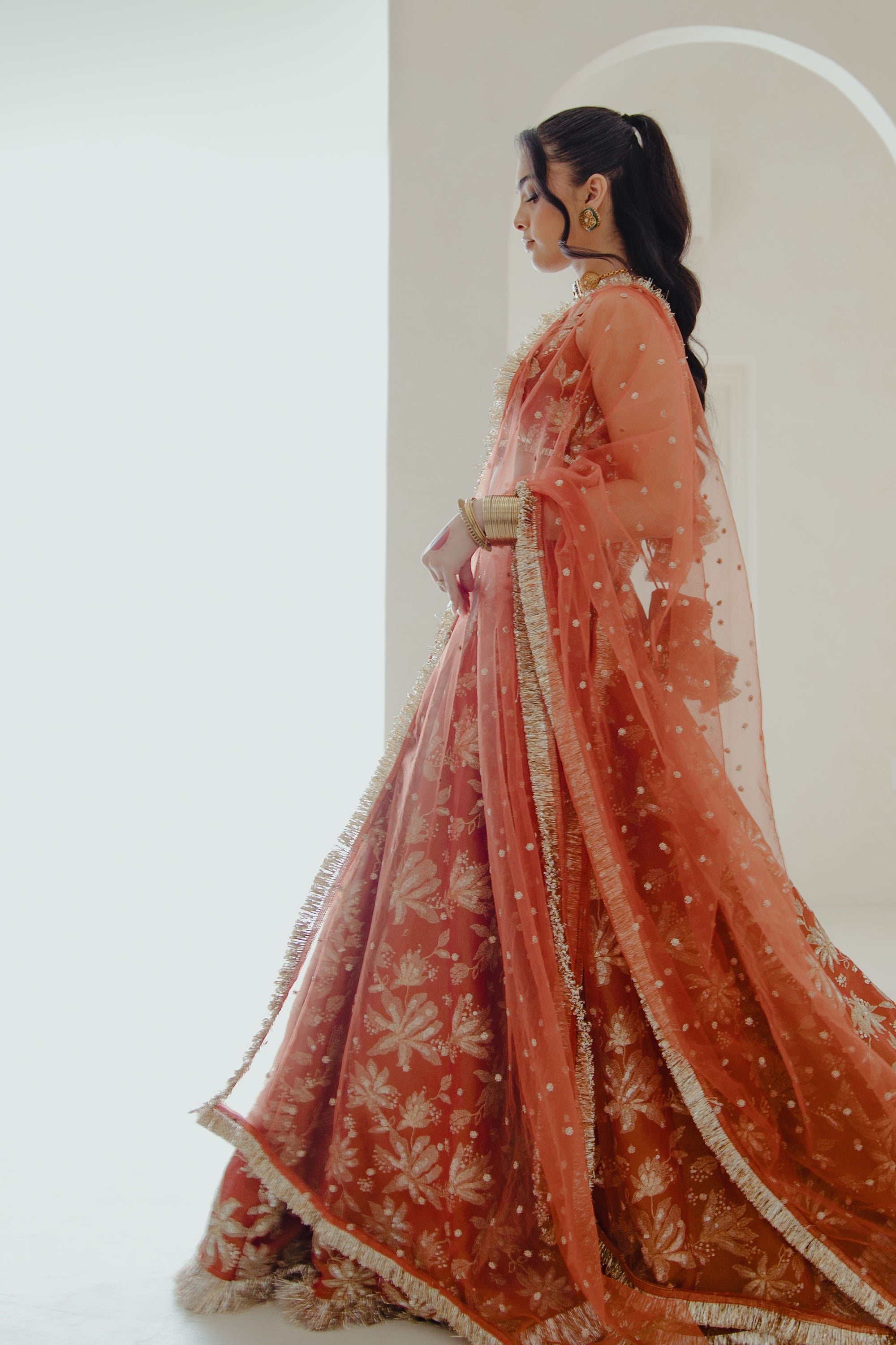 Jodha_lehenga_set_in_sunkissed_rust_side_2_campaign