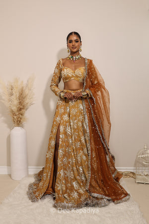 Lakshmi with jodha full circle lehenga  front in amber sienna mustard yellow, for haldi, mehendi jaggo, women wearing lehenga with dupatta