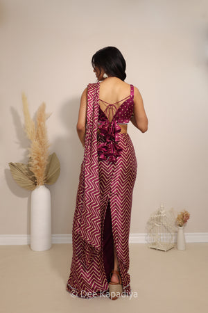 Back view of Dee Kapadiya Pataka pre-draped Saree Set in Masala showing the Phool crop top straps and flowing chevron saree drape