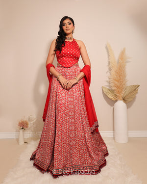 Dee Kapadiya Gehna Lehenga Set with Bahaar Crop Top Mirchi Red — bandhani round neck halter gajji silk top with mirror zari and full flared ajrakh lehenga, Indian wedding guest outfit Canada