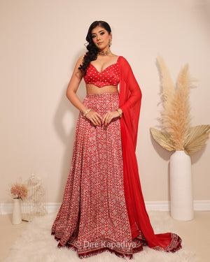 Dee Kapadiya Gehna Lehenga Set with Gehna Crop Top Mirchi Red — bandhani sweetheart crop top with mirror zari and full flared ajrakh lehenga in gajji silk, Indian wedding guest outfit Canada