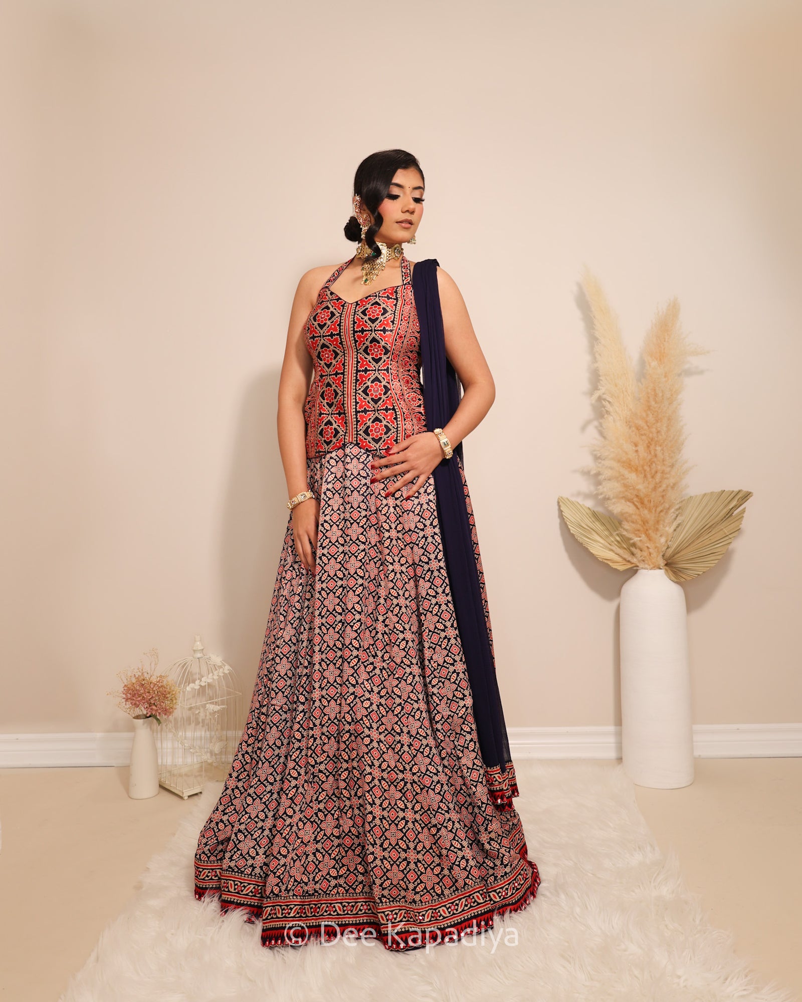 Dee Kapadiya Gehna Lehenga Set Mirchi Red — Mastani halter top and full flared ajrakh lehenga on gajji silk with real mirror work hem border and ajrakh chiffon dupatta, Indian wedding guest outfit Canada