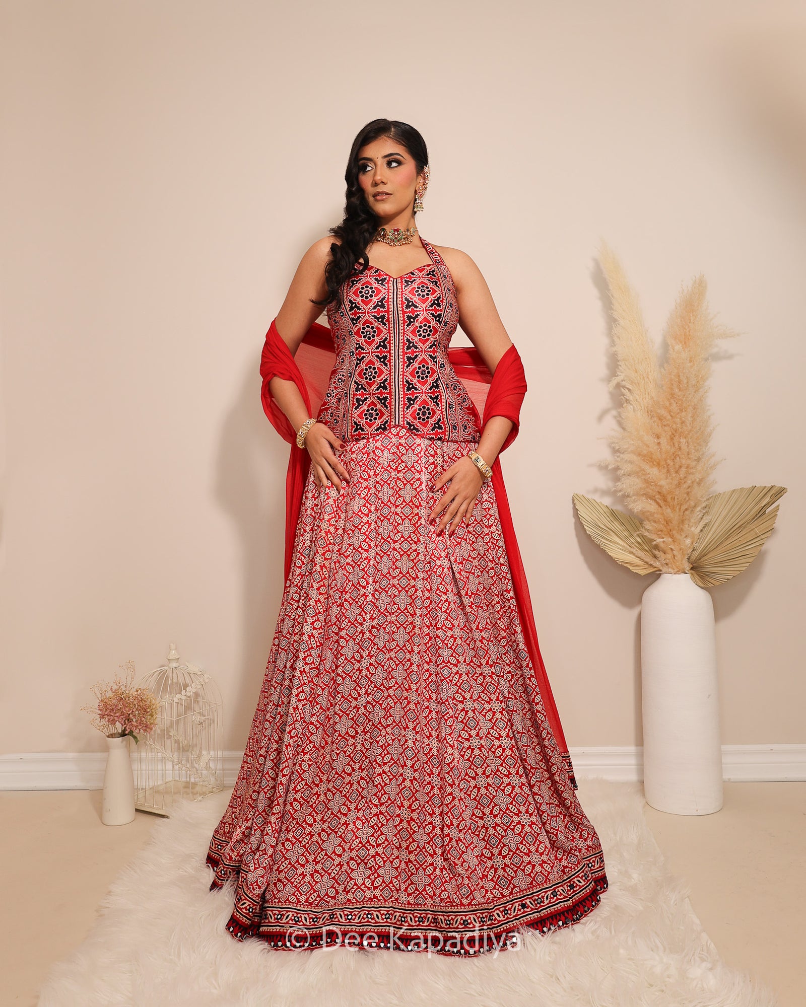 Dee Kapadiya Gehna Lehenga Set Mirchi Red — Mastani halter top and full flared ajrakh lehenga on gajji silk with real mirror work hem border and ajrakh chiffon dupatta, Indian wedding guest outfit Canada