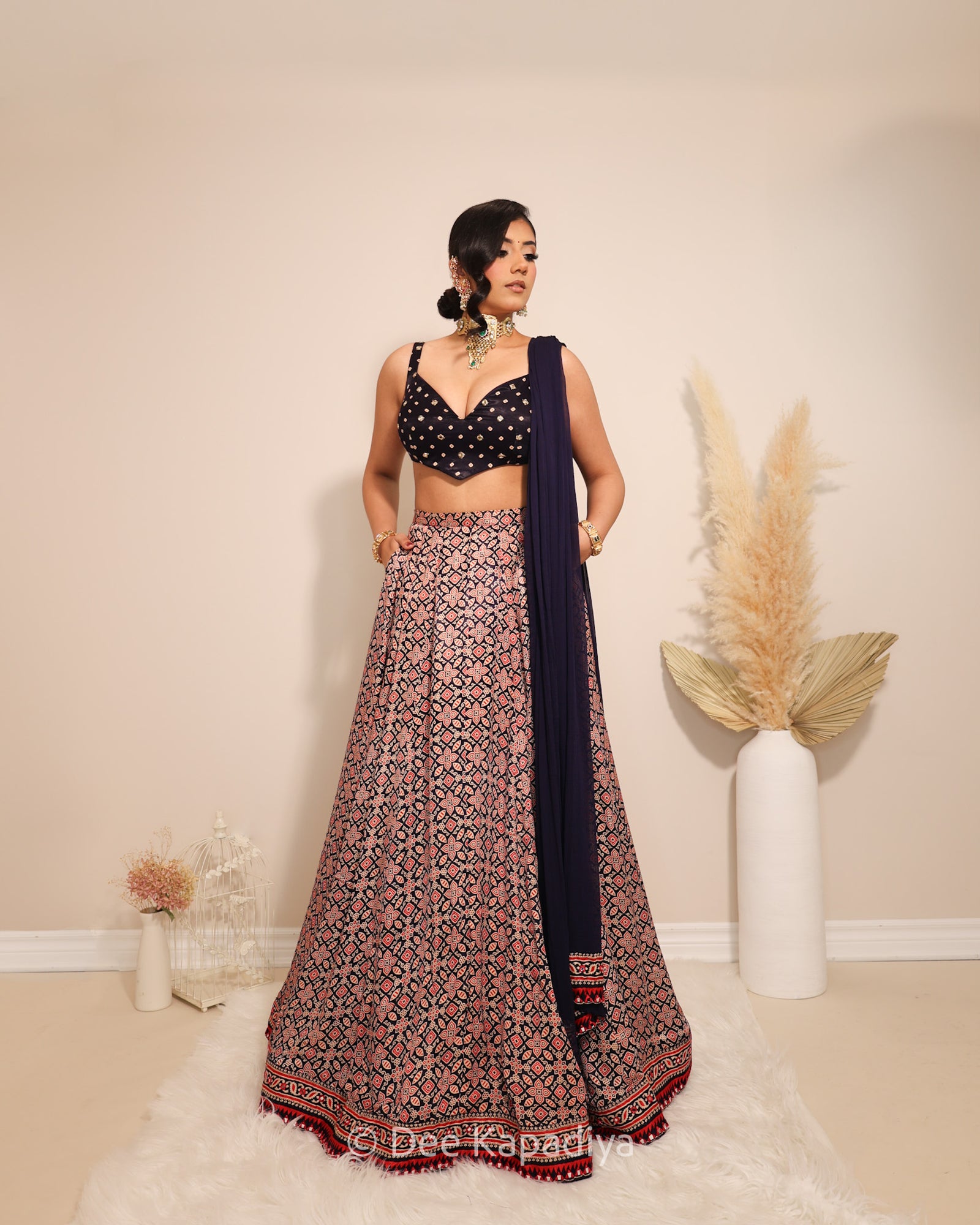 Dee Kapadiya Gehna Lehenga Set with Gehna Crop Top Mirchi Red — bandhani sweetheart crop top with mirror zari and full flared ajrakh lehenga in gajji silk, Indian wedding guest outfit Canada
