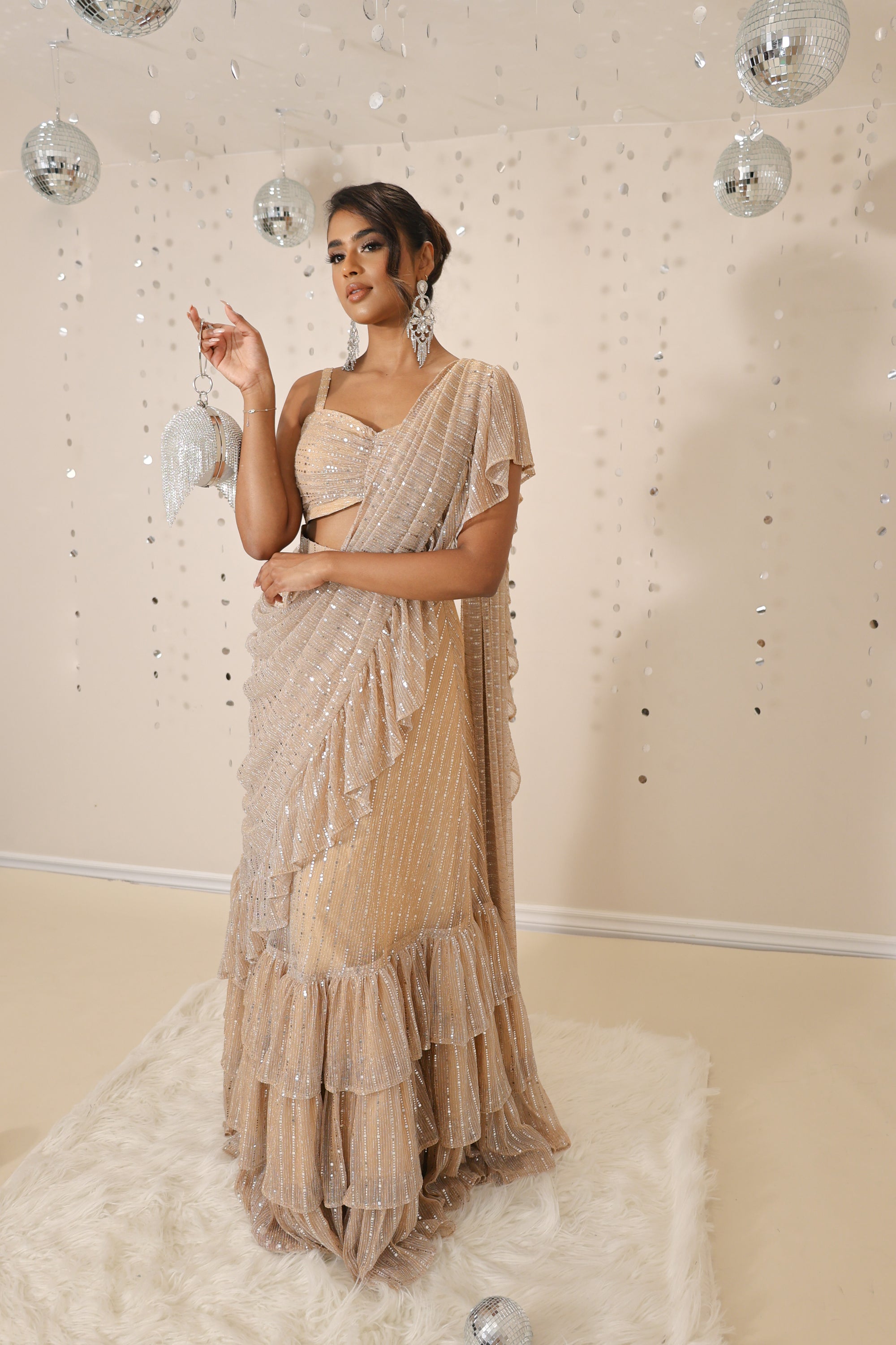 Trendy contemporary pre-stitched ruffle saree silhouette in pastel and nude colours